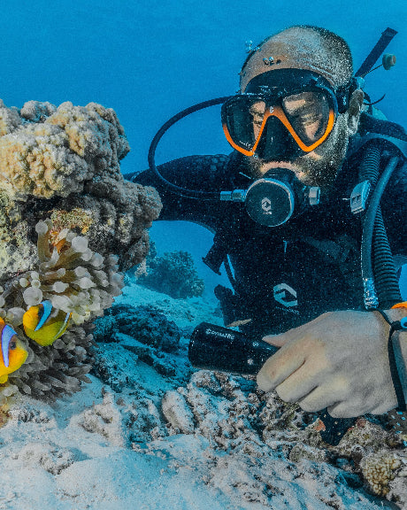Diver wearing DynamicNord dive equipment.