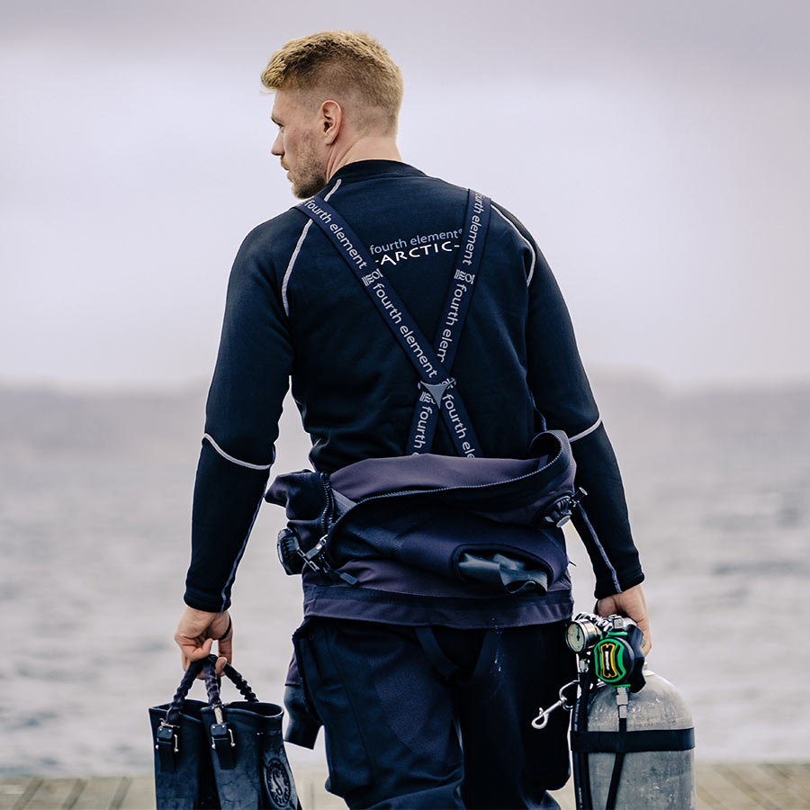 Diver wears Arctic Top and Drysuit